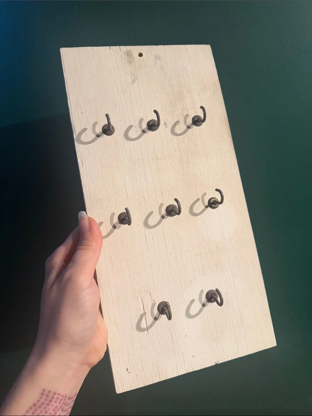 Rustic old worn Wooden Wall Hook Board in Cream with Black Hooks